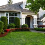 Beautiful home exterior during late spring season with clean landscape and if you need a top divorce attorney find one in Troy.